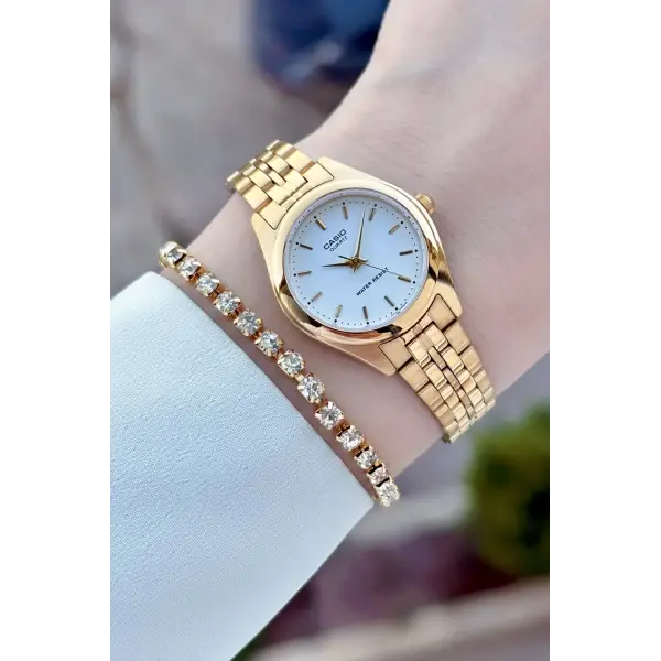 Casio CSISTE208 Casio Kadranı Beyaz Kordonu Gold Renk Kadın Kol Saati