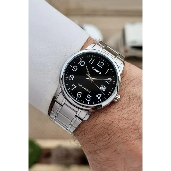 Casio CSISTE205 Kadranı Siyah Kordonu Gümüş Renk Takvimli Hediye Paketli Erkek Kol Saati