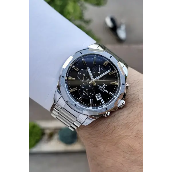 Daniel Klein DKISTE194 Kadranı Siyah Kordonu Gümüş Renk İç Göstergeleri Aktif Fonksiyonlu Erkek Kol Saati