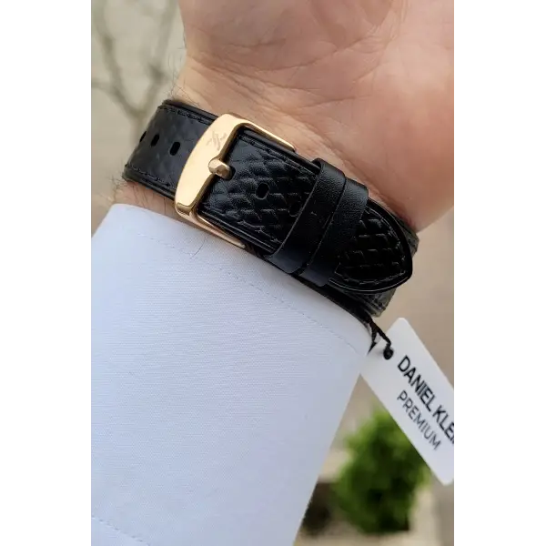 Daniel Klein DKISTE245 Kadranı Beyaz Kordonu Koyu Kahverengi Renk Takvimli Erkek Kol Saati