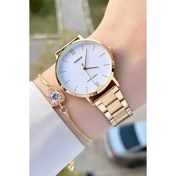 Casio CSISTE86 Gold Renk Hediye Paketli Kadın Kol Saati