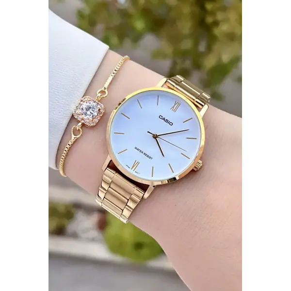 Casio CSISTE86 Gold Renk Hediye Paketli Kadın Kol Saati