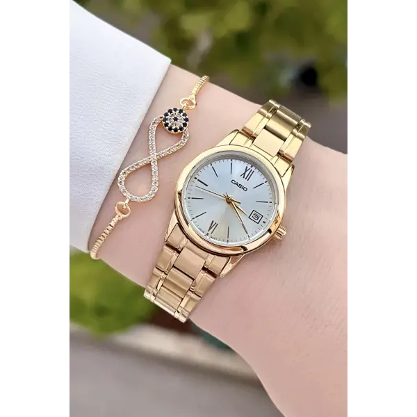 Casio CSISTE71 Gold Renk Hediye Paketli Kadın Kol Saati