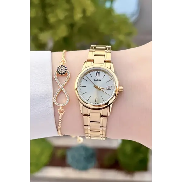 Casio CSISTE71 Gold Renk Hediye Paketli Kadın Kol Saati