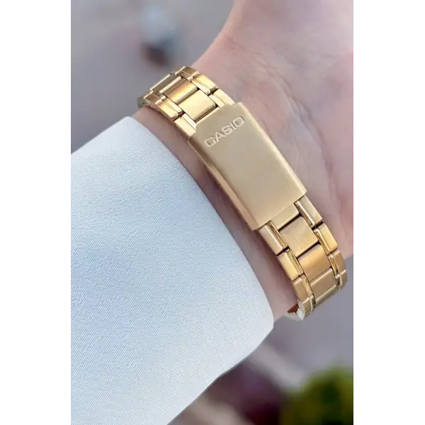 Casio CSISTE213 Casio Gold Renk Takvimli Hediye Paketli Kadın Kol Saati