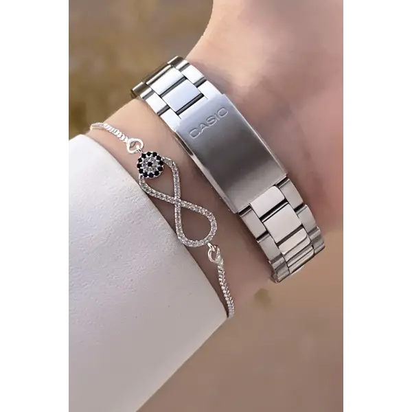 Casio CSISTE173 Kadranı Beyaz Kordonu Metalik Renk 2 Yıl Garantili Kadın Kol Saati