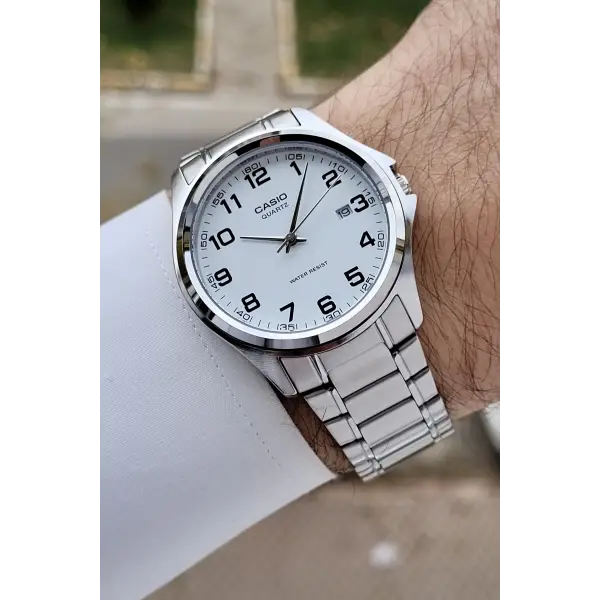 Casio CSISTE198 Kadranı Beyaz Rakamlı Kordonu Metalik Renk 2 Yıl Garantili Erkek Kol Saati