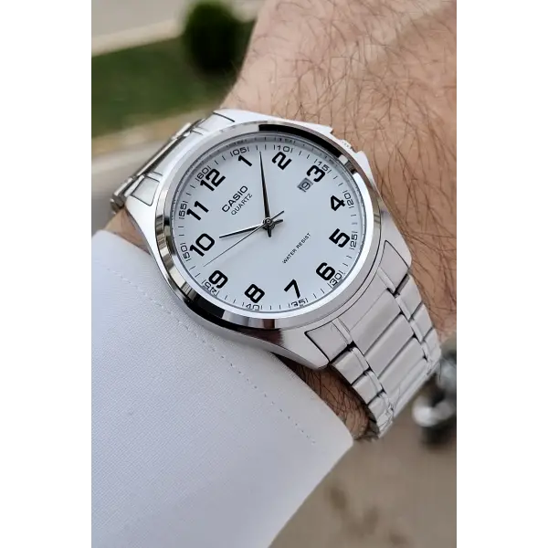 Casio CSISTE198 Kadranı Beyaz Rakamlı Kordonu Metalik Renk 2 Yıl Garantili Erkek Kol Saati