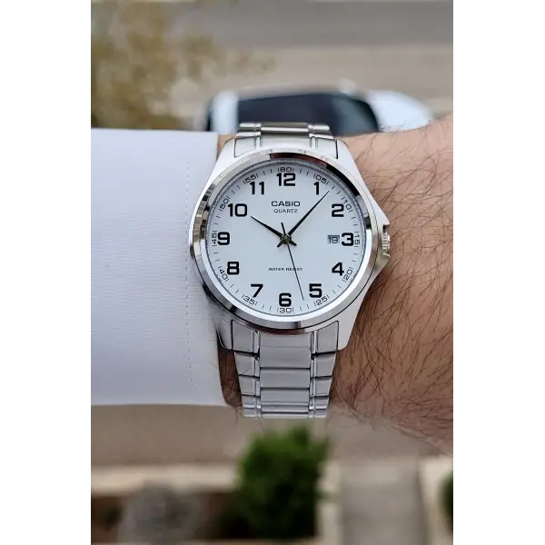 Casio CSISTE198 Kadranı Beyaz Rakamlı Kordonu Metalik Renk 2 Yıl Garantili Erkek Kol Saati