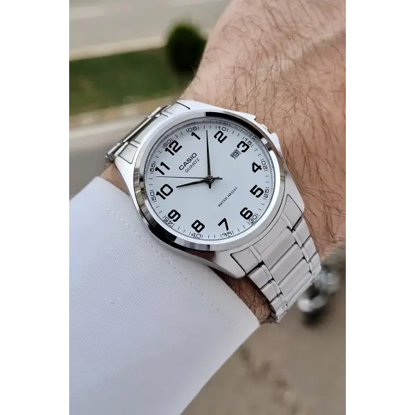 Casio CSISTE198 Kadranı Beyaz Rakamlı Kordonu Metalik Renk 2 Yıl Garantili Erkek Kol Saati