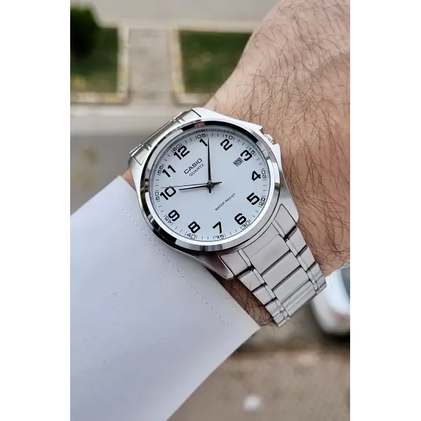 Casio CSISTE198 Kadranı Beyaz Rakamlı Kordonu Metalik Renk 2 Yıl Garantili Erkek Kol Saati