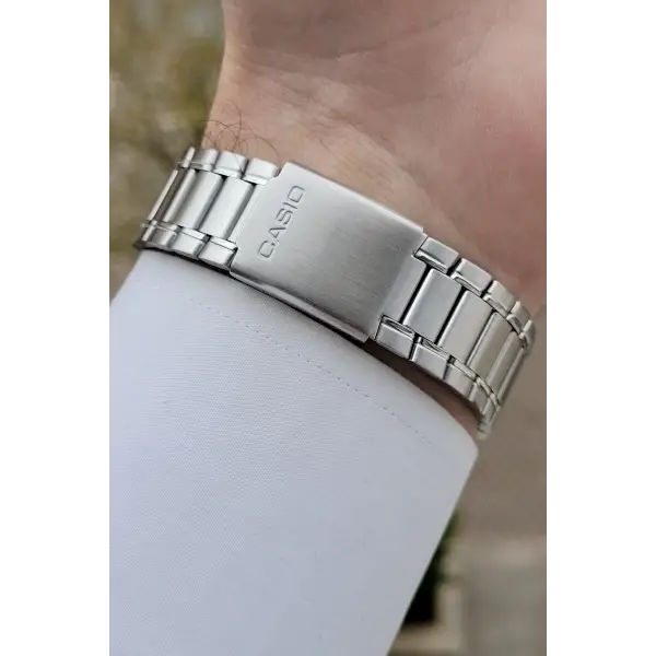 Casio CSISTE198 Kadranı Beyaz Rakamlı Kordonu Metalik Renk 2 Yıl Garantili Erkek Kol Saati
