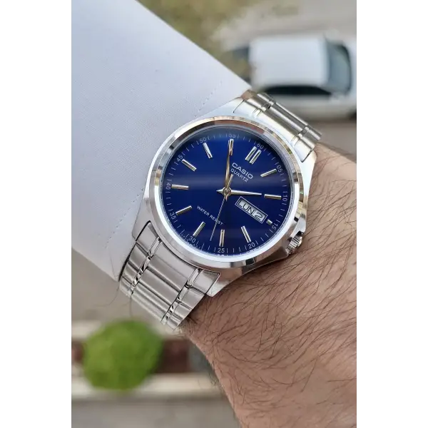 Casio CSISTE95 Kadranı Lacivert Kordonu Gümüş Renk Gün ve Takvim Fonksiyonlu Hediye Paketli Erkek Kol Saati