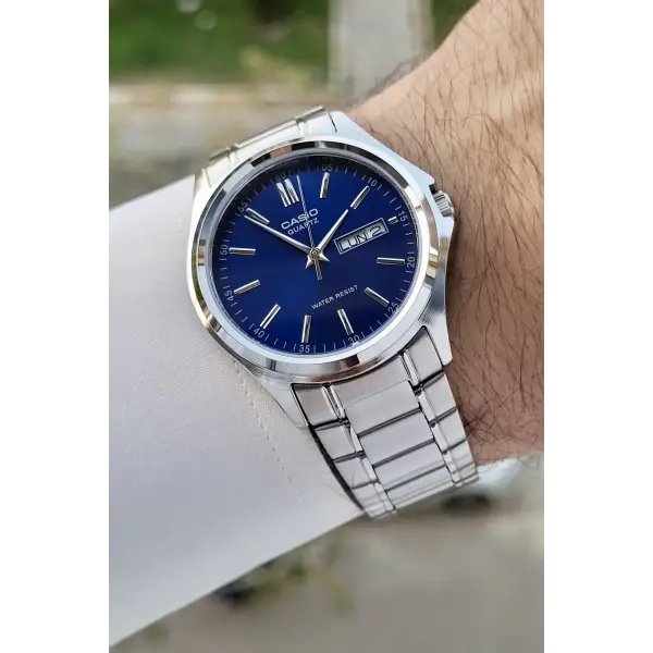 Casio CSISTE95 Kadranı Lacivert Kordonu Gümüş Renk Gün ve Takvim Fonksiyonlu Hediye Paketli Erkek Kol Saati