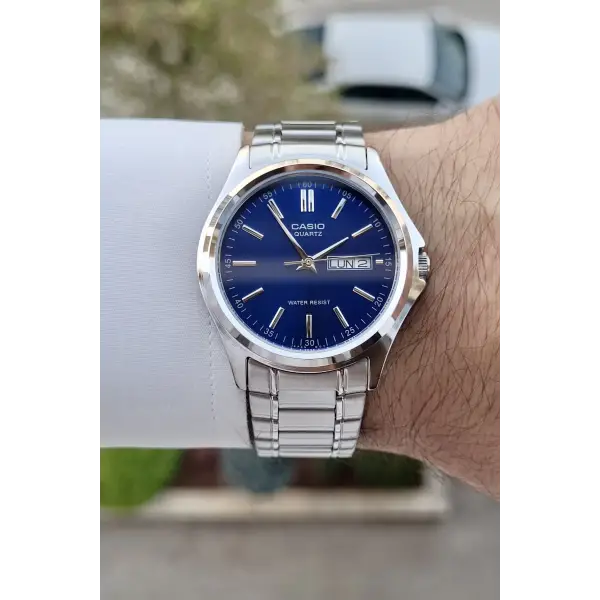 Casio CSISTE95 Kadranı Lacivert Kordonu Gümüş Renk Gün ve Takvim Fonksiyonlu Hediye Paketli Erkek Kol Saati