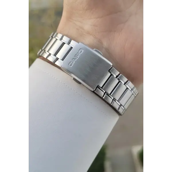 Casio CSISTE95 Kadranı Lacivert Kordonu Gümüş Renk Gün ve Takvim Fonksiyonlu Hediye Paketli Erkek Kol Saati