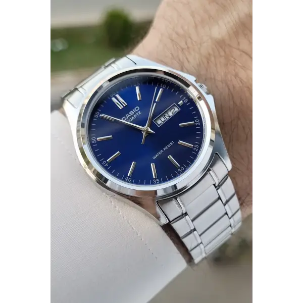 Casio CSISTE95 Kadranı Lacivert Kordonu Gümüş Renk Gün ve Takvim Fonksiyonlu Hediye Paketli Erkek Kol Saati