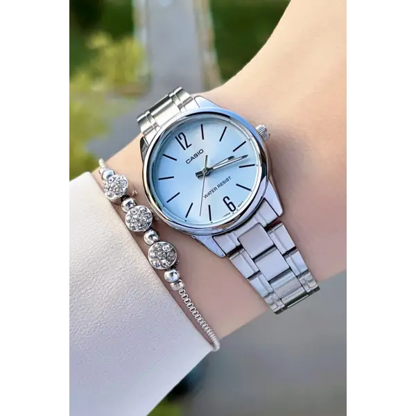 Casio CSISTE65 Kadranı Mavi Kordonu Gümüş Renk Hediye Paketli Kadın Kol Saati