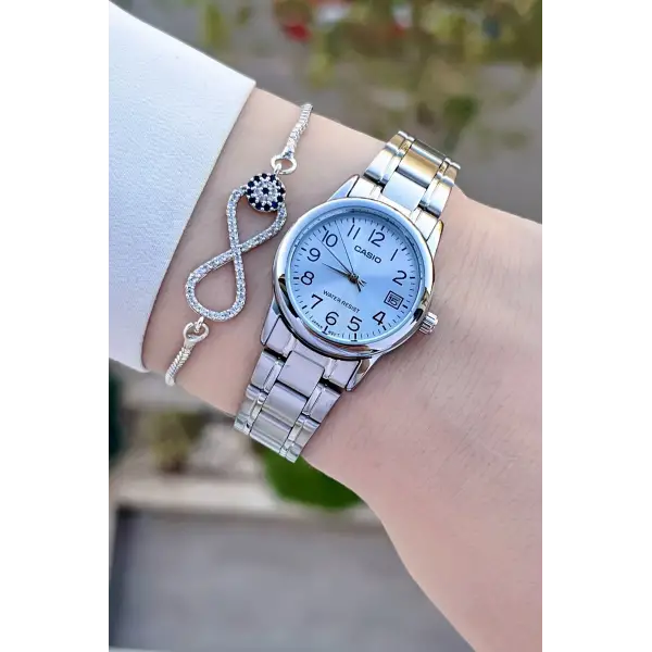 Casio CSISTE110 Kadranı Mavi Kordonu Gümüş Renk Takvimli Hediye Paketli Kadın Kol Saati