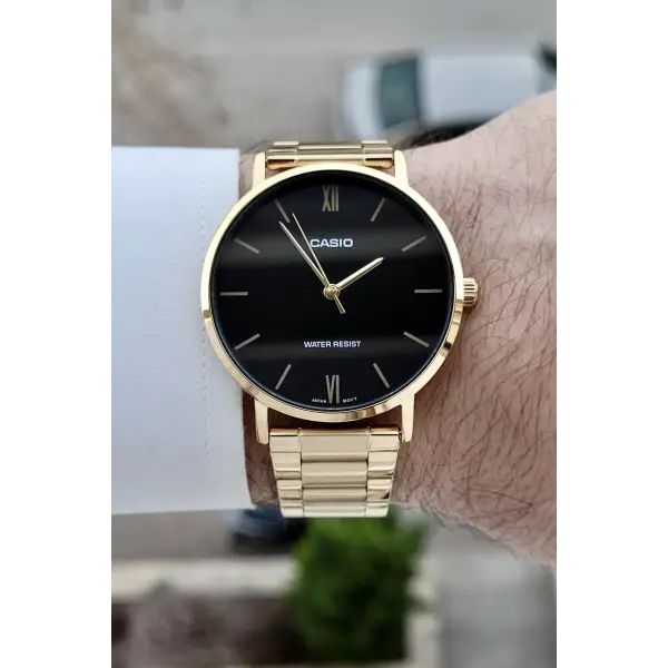 Casio CSISTE220 Casio Kadranı Siyah Kordonu Gold Renk Hediye Paketli Erkek Kol Saati