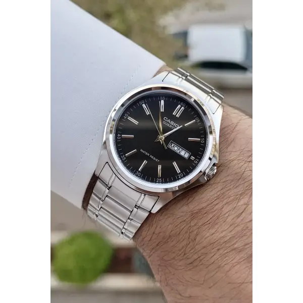 Casio CSISTE94 Kadranı Siyah Kordonu Gümüş Renk Gün ve Takvim Fonksiyonlu Hediye Paketli Erkek Kol Saati