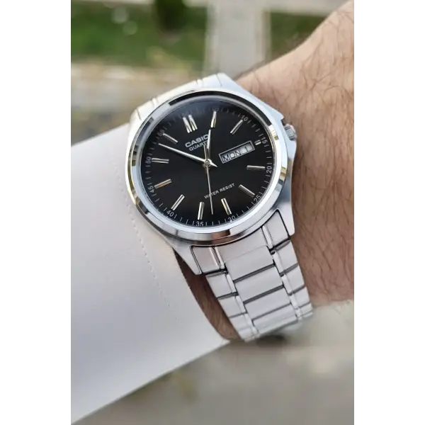 Casio CSISTE94 Kadranı Siyah Kordonu Gümüş Renk Gün ve Takvim Fonksiyonlu Hediye Paketli Erkek Kol Saati