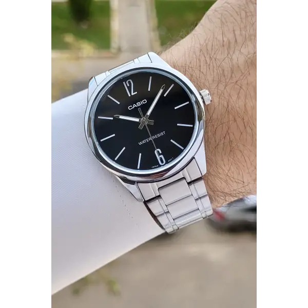 Casio CSISTE102 Kadranı Siyah Kordonu Gümüş Renk Hediye Paketli Erkek Kol Saati