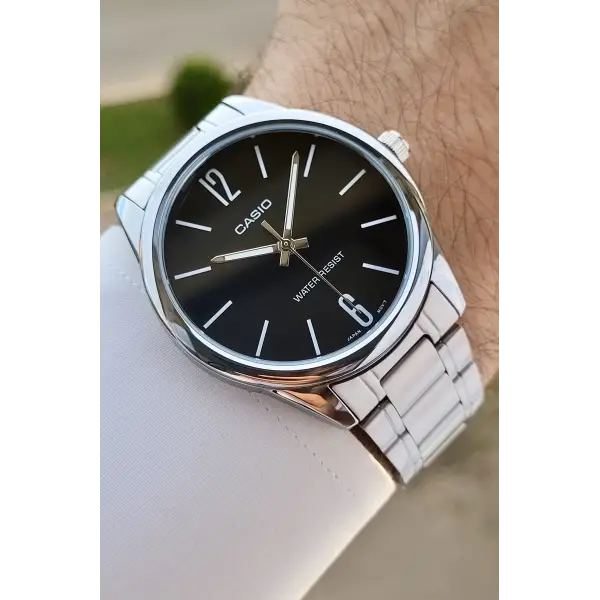 Casio CSISTE102 Kadranı Siyah Kordonu Gümüş Renk Hediye Paketli Erkek Kol Saati