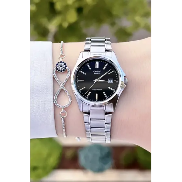 Casio CSISTE62 Kadranı Siyah Kordonu Gümüş Renk Hediye Paketli Kadın Kol Saati