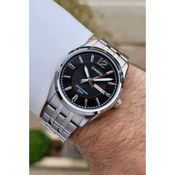 Casio CSISTE195 Kadranı Siyah Kordonu Metalik Renk 2 Yıl Garantili Erkek Kol Saati