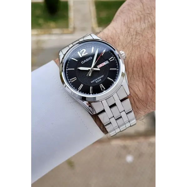 Casio CSISTE195 Kadranı Siyah Kordonu Metalik Renk 2 Yıl Garantili Erkek Kol Saati