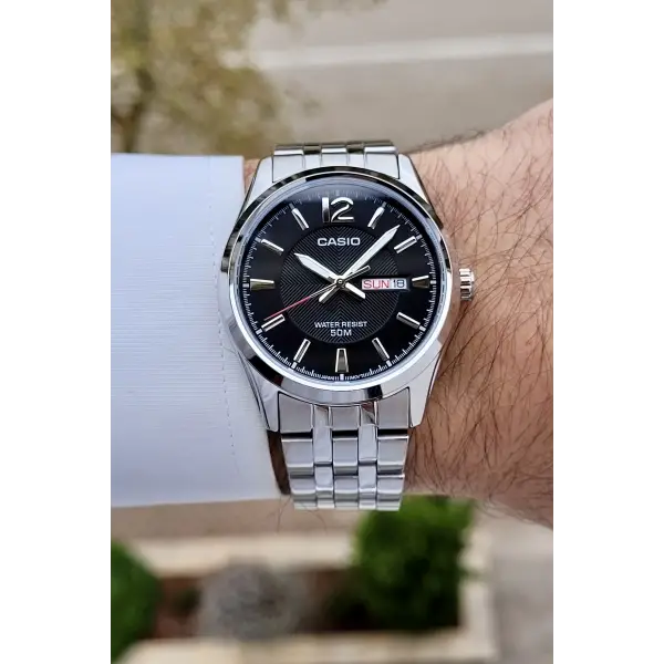 Casio CSISTE195 Kadranı Siyah Kordonu Metalik Renk 2 Yıl Garantili Erkek Kol Saati