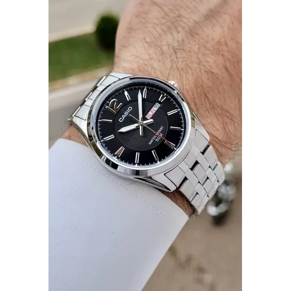 Casio CSISTE195 Kadranı Siyah Kordonu Metalik Renk 2 Yıl Garantili Erkek Kol Saati