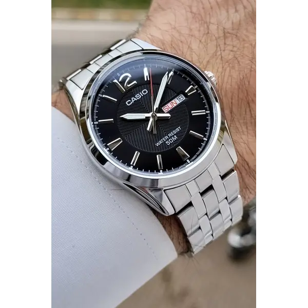 Casio CSISTE195 Kadranı Siyah Kordonu Metalik Renk 2 Yıl Garantili Erkek Kol Saati