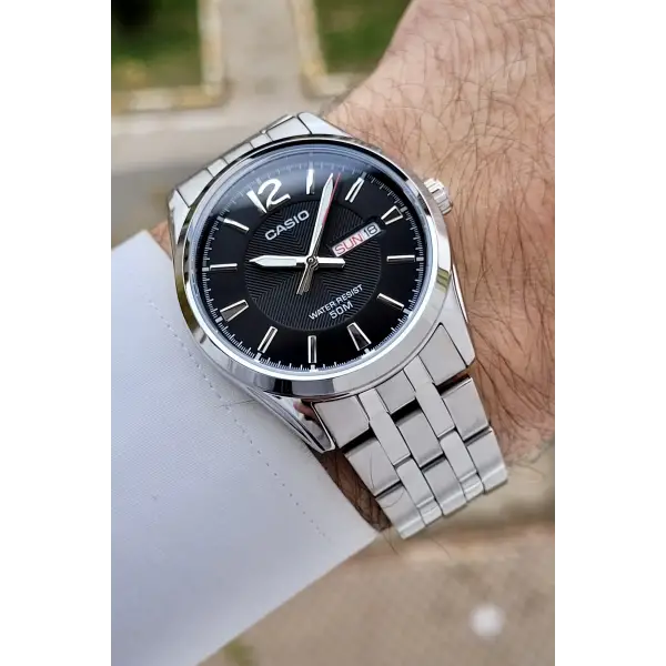 Casio CSISTE195 Kadranı Siyah Kordonu Metalik Renk 2 Yıl Garantili Erkek Kol Saati
