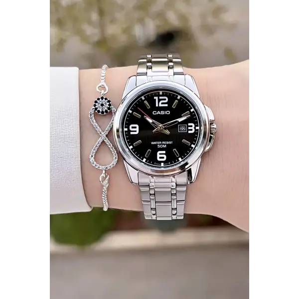 Casio CSISTE175 Kadranı Siyah Kordonu Metalik Renk 2 Yıl Garantili Kadın Kol Saati