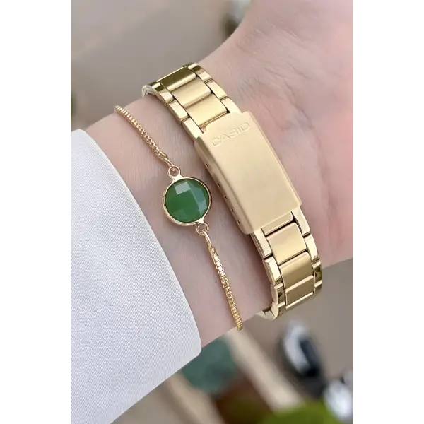 Casio CSISTE47 Kadranı Yeşil Kordonu Gold Renk Hediye Paketli Kadın Kol Saati