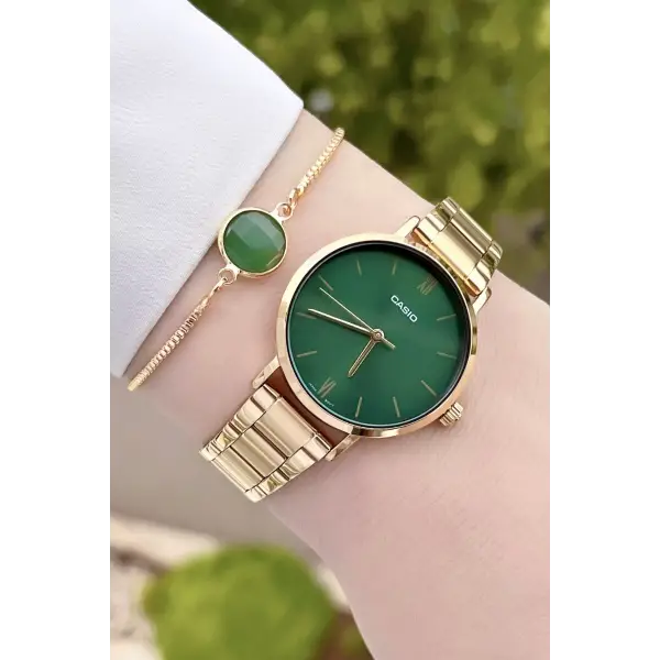 Casio CSISTE47 Kadranı Yeşil Kordonu Gold Renk Hediye Paketli Kadın Kol Saati