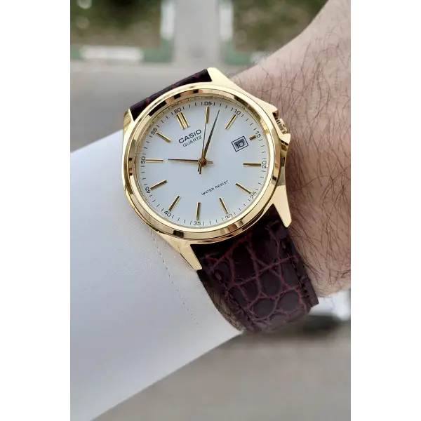 Casio CSISTE209 Casio Kasası Gold Kadranı Beyaz Kordonu Kahverengi Renk Hediye Paketli Erkek Kol Saati