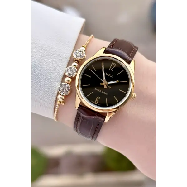 Casio CSISTE216 Casio Kasası Gold Kadranı Siyah Renk Hediye Paketli Kadın Kol Saati