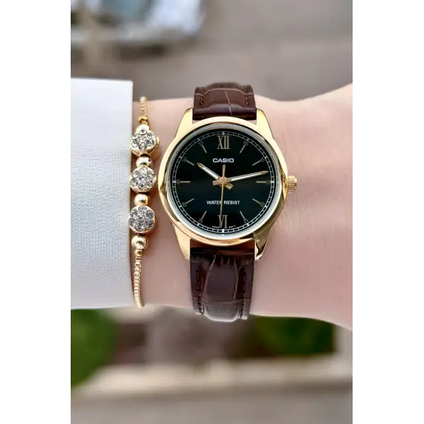 Casio CSISTE219 Casio Kasası Gold Kordonu Kahverengi Renk Hediye Paketli Kadın Kol Saati