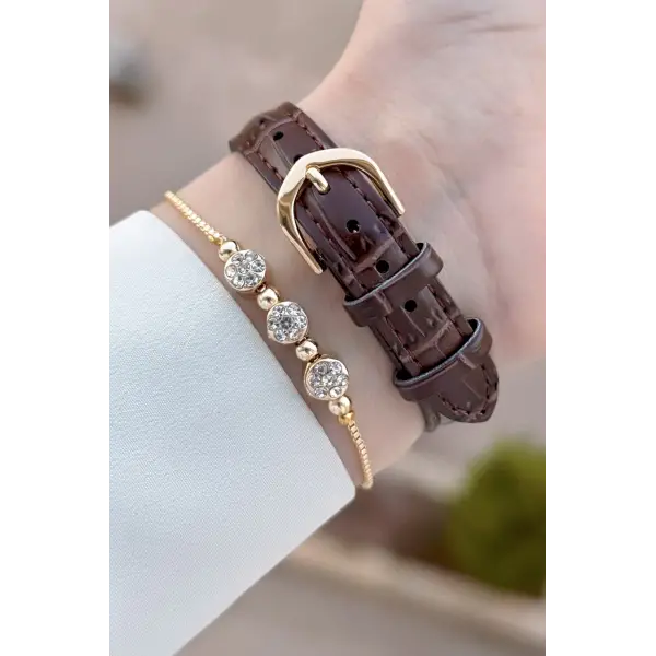 Casio CSISTE217 Casio Kasası Gold Kordonu Kahverengi Renk Hediye Paketli Kadın Kol Saati