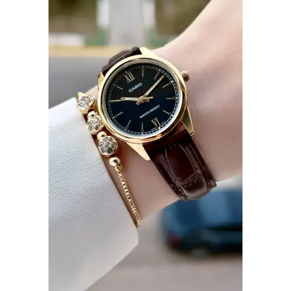 Casio CSISTE219 Casio Kasası Gold Kordonu Kahverengi Renk Hediye Paketli Kadın Kol Saati