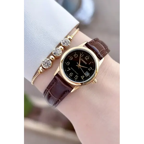 Casio CSISTE214 Casio Kasası Gold Kordonu Kahverengi Renk Takvimli Hediye Paketli Kadın Kol Saati
