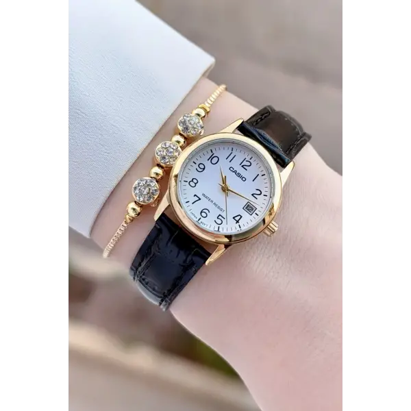 Casio CSISTE215 Casio Kasası Gold Kordonu Siyah Renk Takvimli Hediye Paketli Kadın Kol Saati
