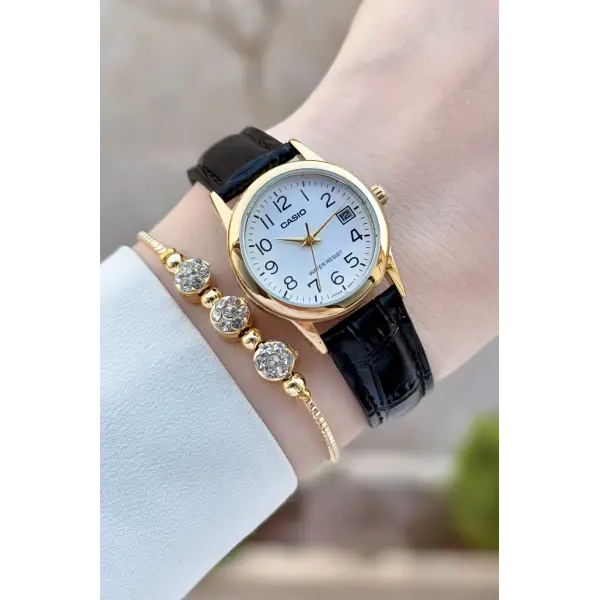 Casio CSISTE215 Casio Kasası Gold Kordonu Siyah Renk Takvimli Hediye Paketli Kadın Kol Saati