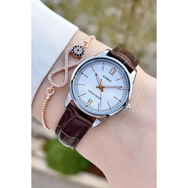 Casio CSISTE149 Kasası Gümüş Kordonu Kahverengi Renk Kadın Kol Saati