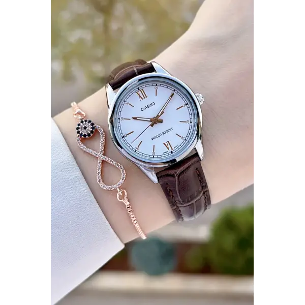 Casio CSISTE149 Kasası Gümüş Kordonu Kahverengi Renk Kadın Kol Saati