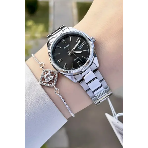 Casio CSISTE61 Rakamları ve Kordonu Gümüş Renk Hediye Paketli Kadın Kol Saati