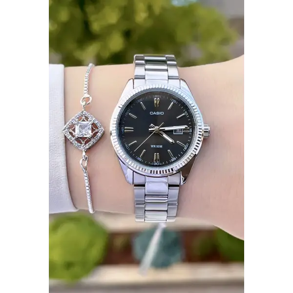 Casio CSISTE61 Rakamları ve Kordonu Gümüş Renk Hediye Paketli Kadın Kol Saati